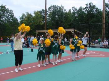 group of cheering cheerleaders