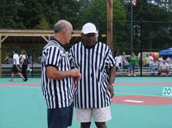 two referees conferring